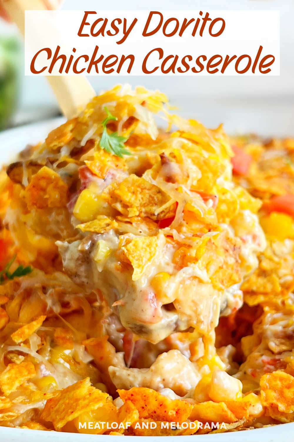 Dorito Chicken Casserole is an easy recipe made with rotisserie chicken, cheddar cheese and Doritos in a creamy sauce. A delicious casserole the whole family loves and perfect for a busy weeknight! via @meamel