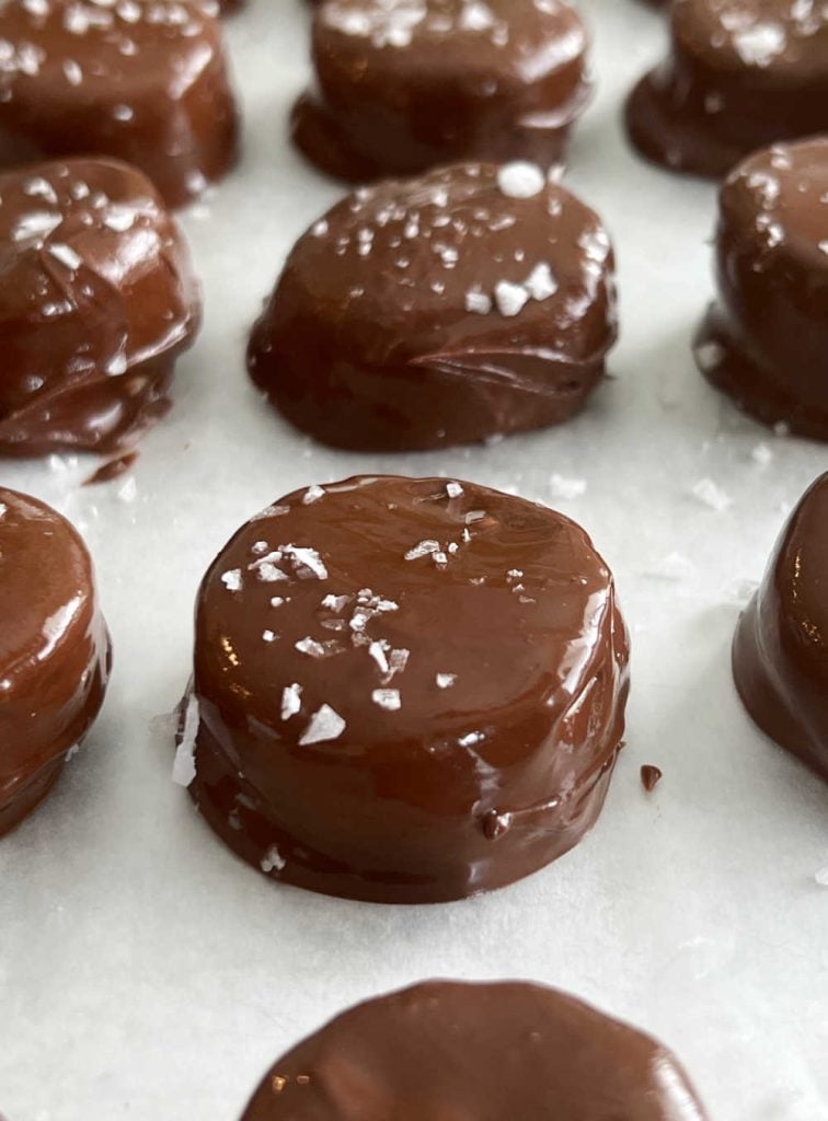 sprinkle flaked salt on top of chocolate covered banana slices