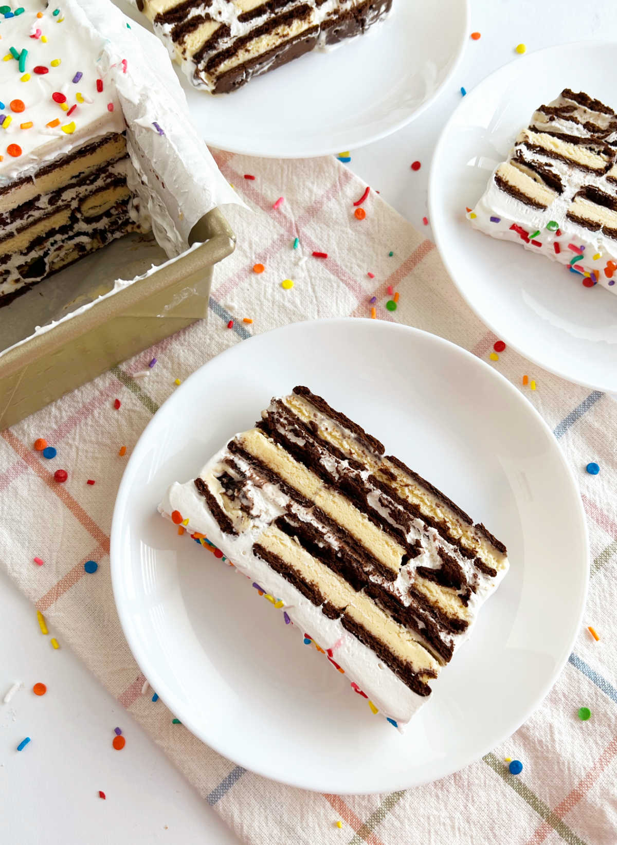 slices of ice cream sandwich cake on plates