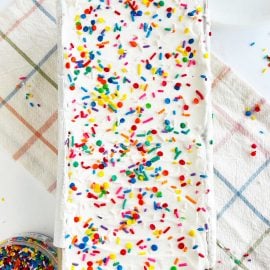 ice cream sandwich cake with sprinkles in loaf pan