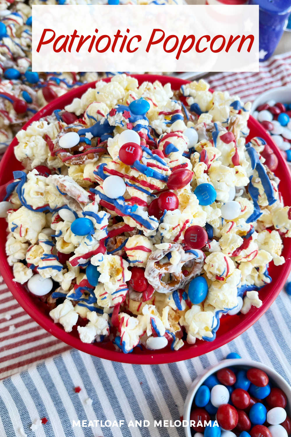 Patriotic Popcorn with white chocolate, pretzels and colorful candy in an easy red white and blue dessert perfect for Fourth of July and other patriotic holidays. Everyone loves this salty and sweet treat! via @meamel