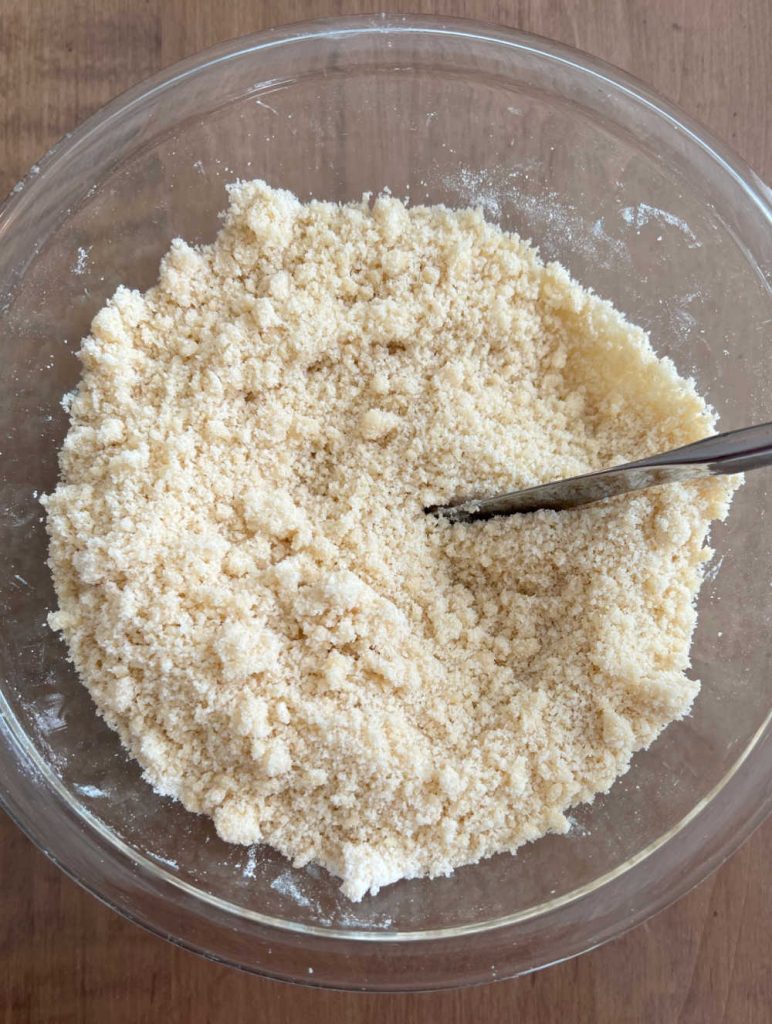 cut butter flour mixture with knife in medium mixing bowl