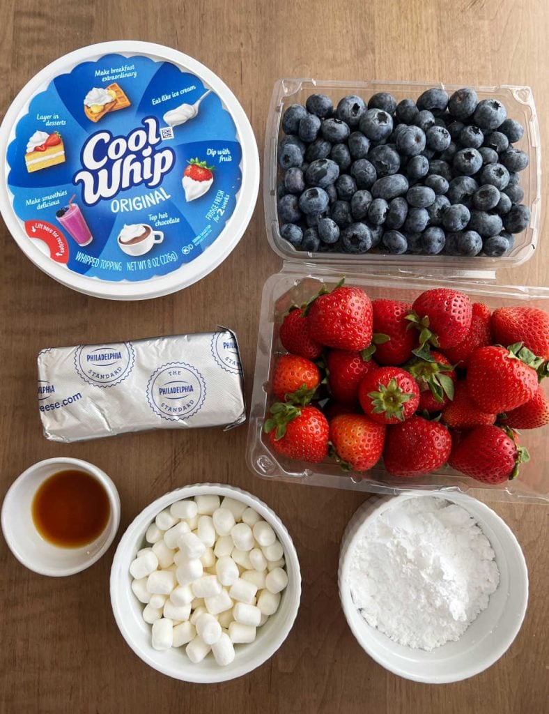 fresh strawberries, blueberries, cool whip, cream cheese, vanilla extract, mini marshmallows and powdered sugar