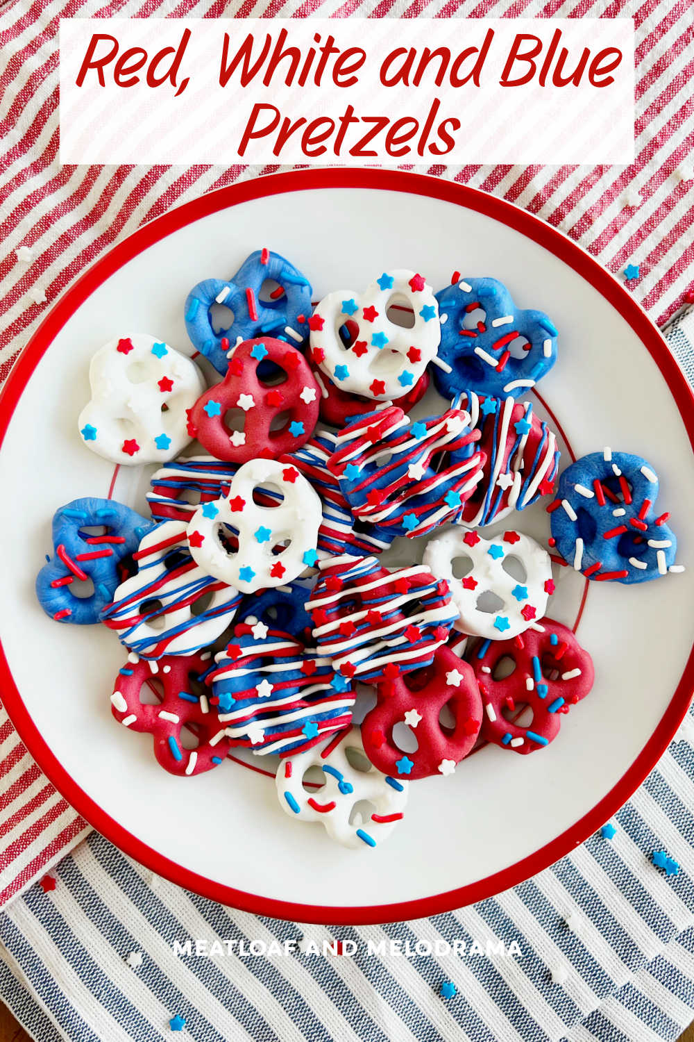 Red White and Blue Pretzels dipped in melted candy coating and topped with patriotic sprinkles are an easy sweet treat for the Fourth of July, Memorial Day and other patriotic holidays.  via @meamel