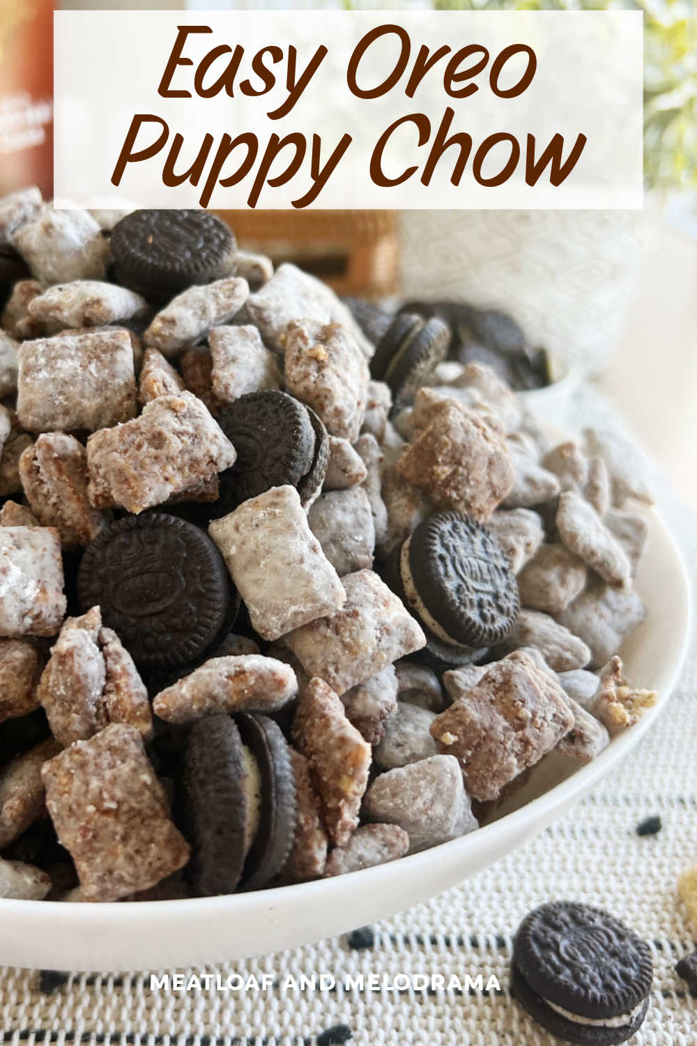 Easy OREO Puppy Chow (Muddy Buddies) made with Chex cereal, peanut butter, chocolate, powdered sugar and Oreo cookies is a delicious sweet salty snack for humans. Once you start munching, it's hard to stop! via @meamel