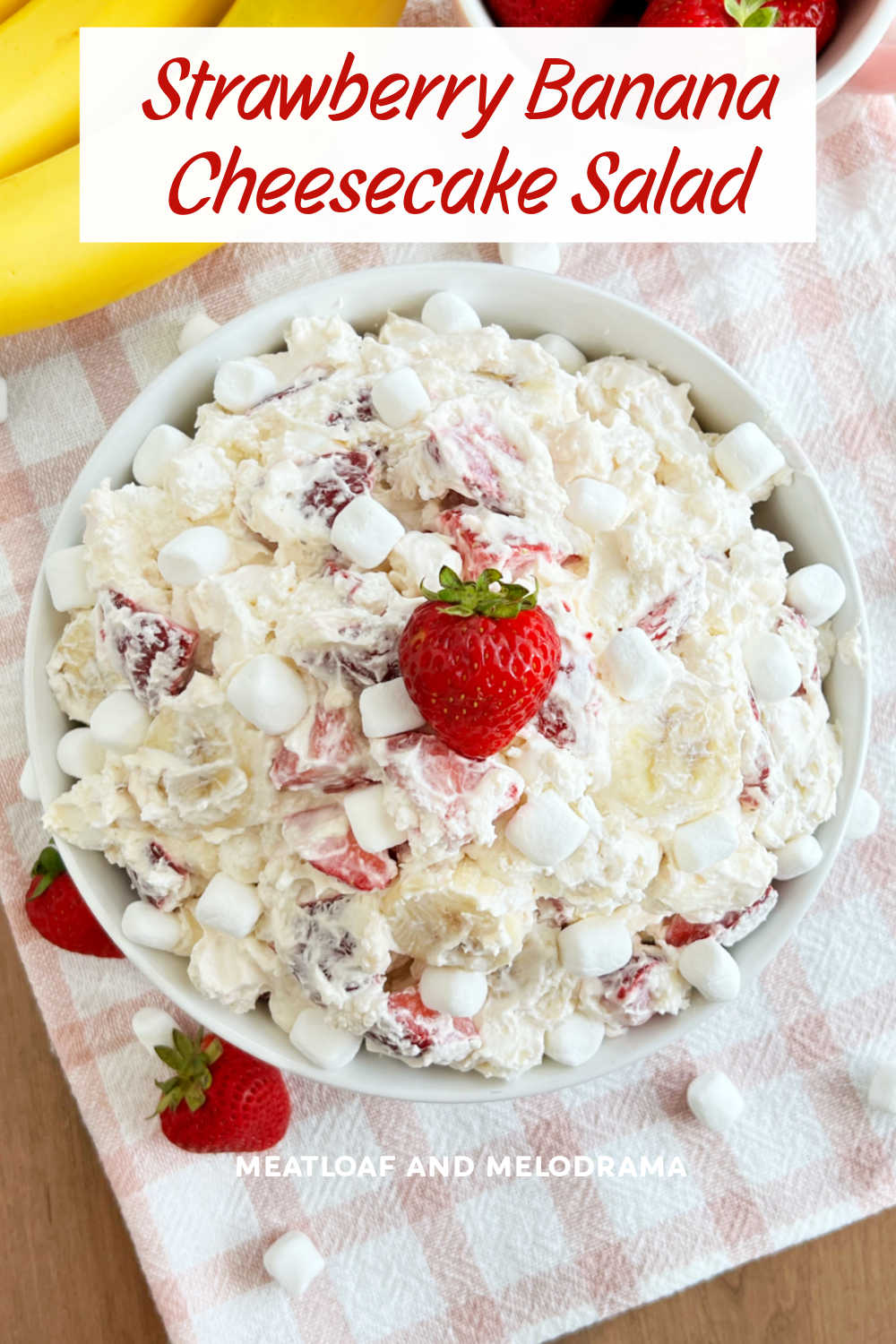 Easy Strawberry Banana Cheesecake Salad recipe combines fresh strawberries with sweet bananas in a creamy cheesecake filling. This delicious dessert salad is the perfect side dish for a church potluck, summer BBQ or family gathering! via @meamel