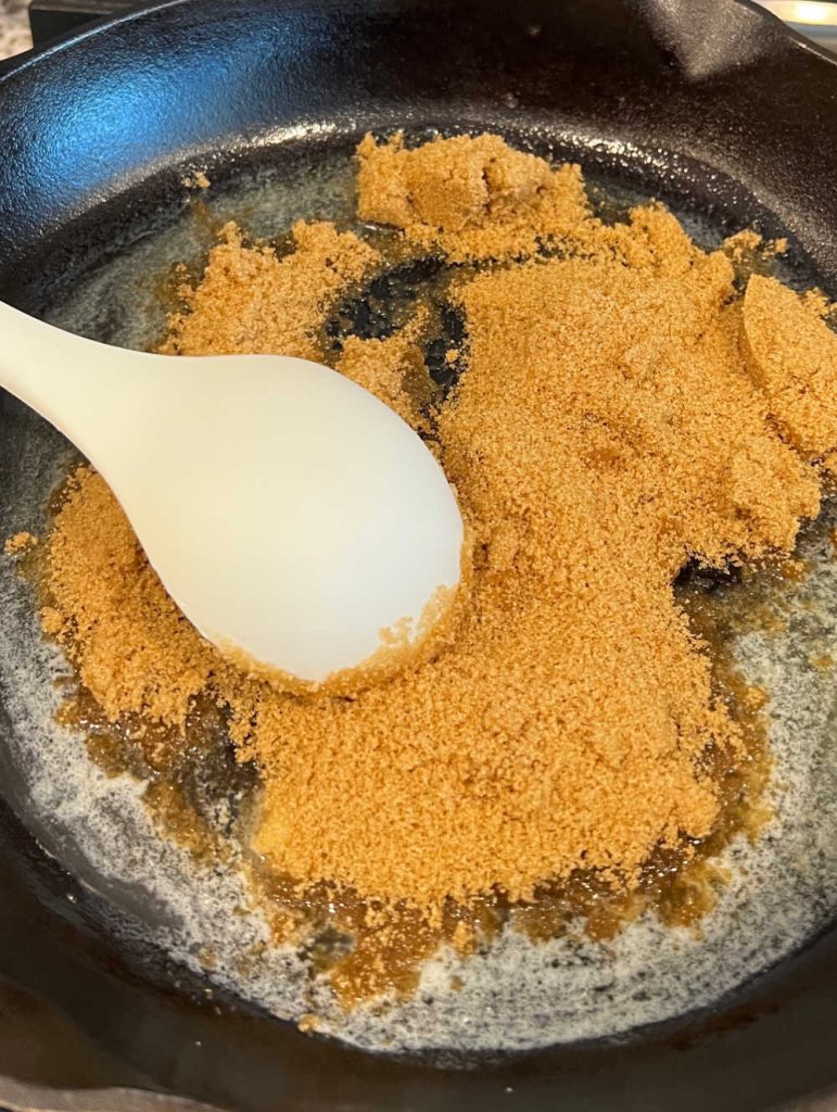 melt butter and brown sugar in cast iron skillet.