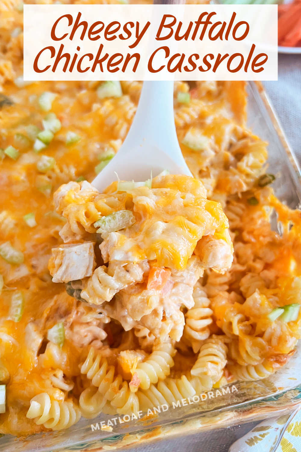 This Easy Buffalo Chicken Casserole recipe combines cooked chicken with pasta and frozen vegetables baked in a creamy cheesy sauce. An easy dinner recipe the whole family loves! via @meamel