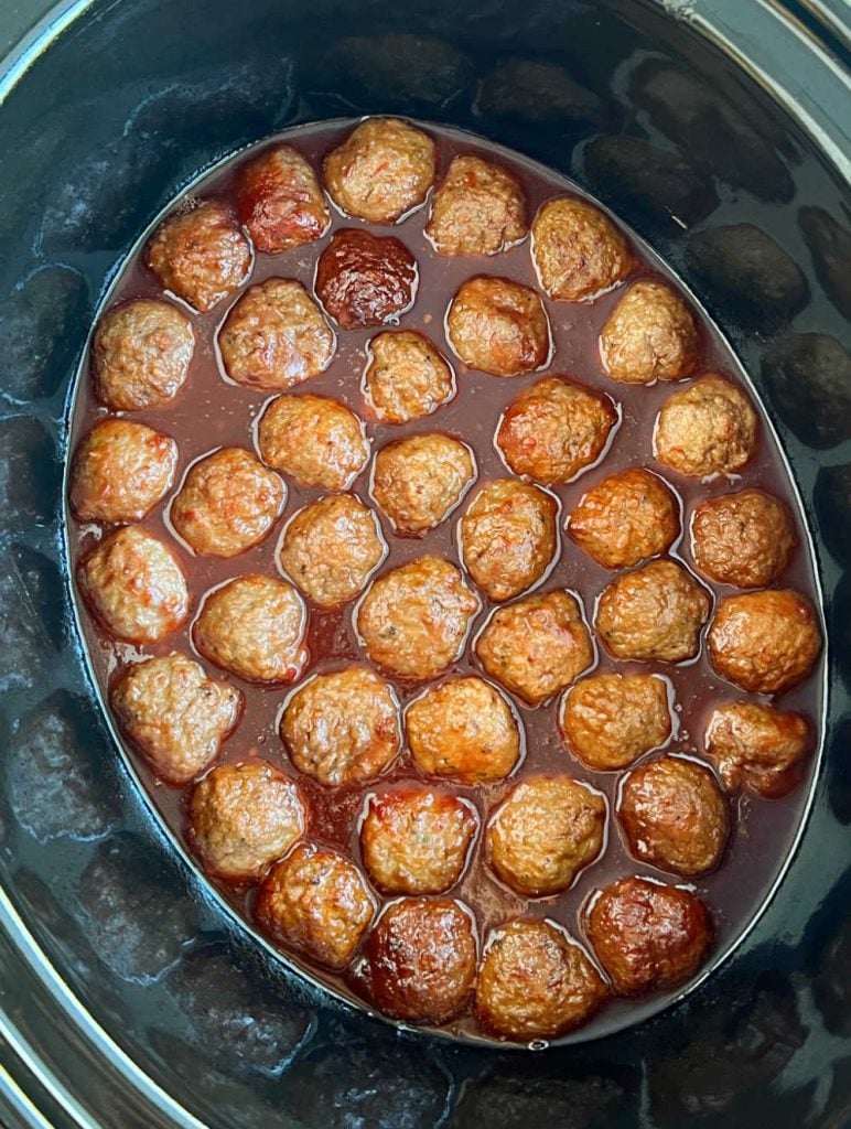 meatballs with grape jelly and chili sauce in crockpot