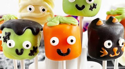 Halloween marshmallow pops in cake pops holder.