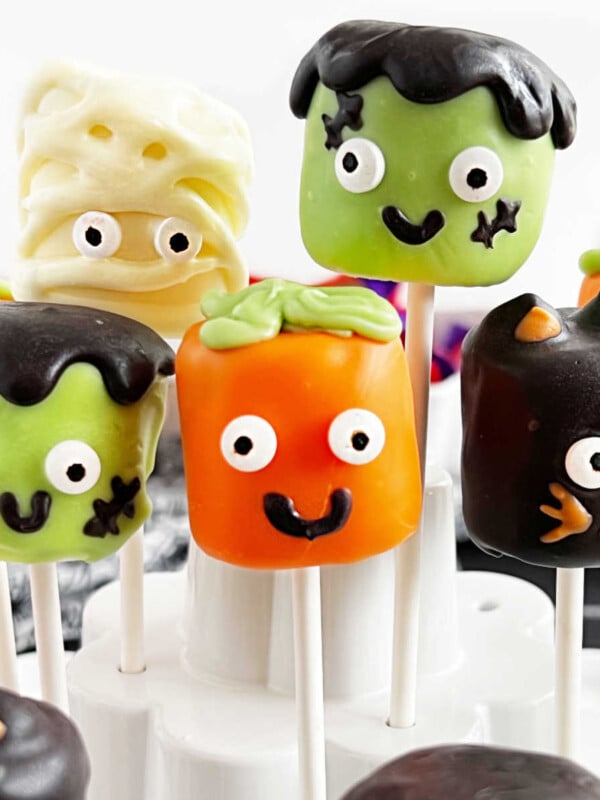 Halloween marshmallow pops in cake pops holder.