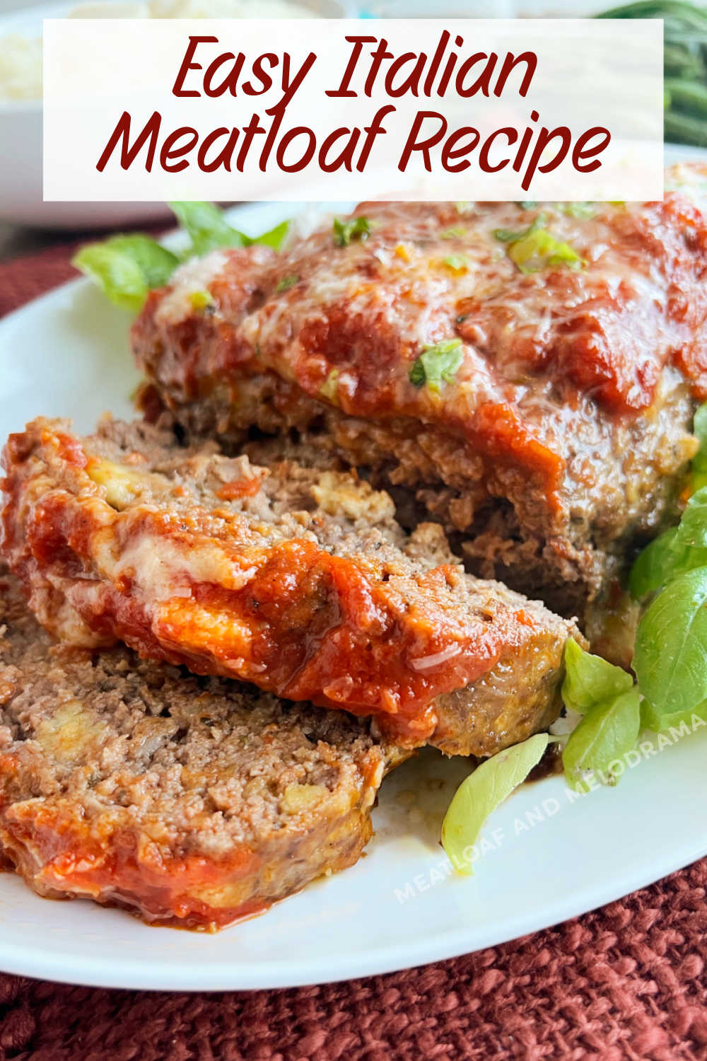 Italian Meatloaf is an easy meatloaf recipe made with Italian sausage and ground beef and topped with marinara sauce and Parmesan cheese. This easy dinner is basically one giant meatball!  via @meamel