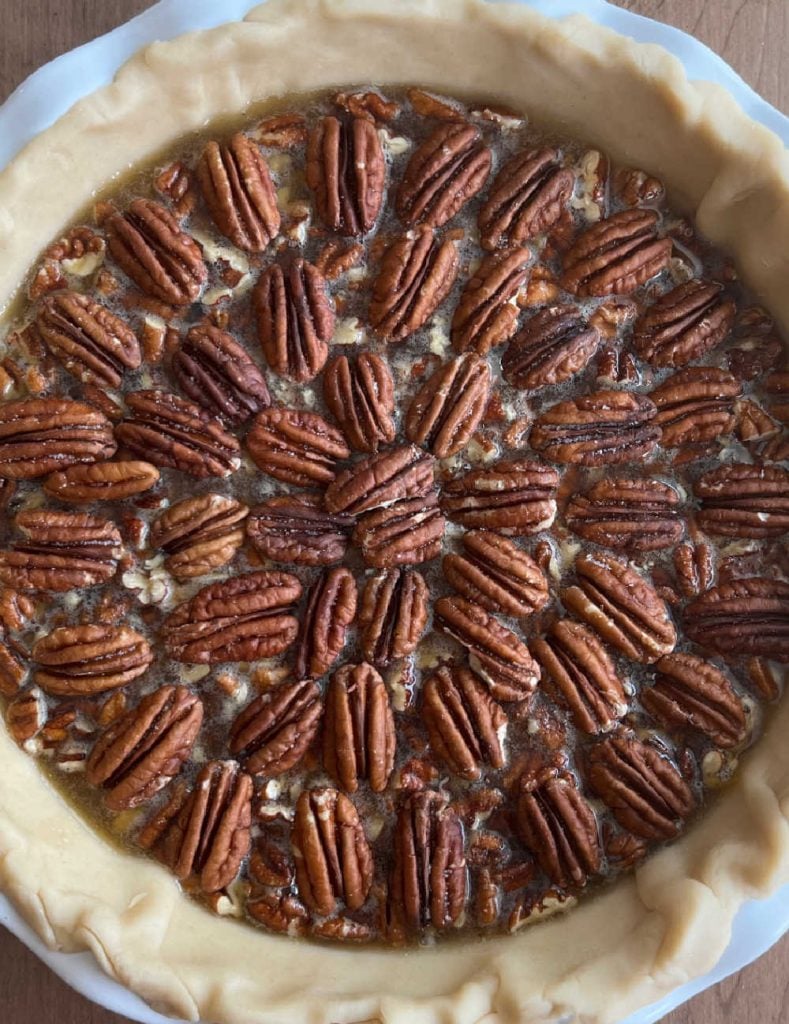 pecan halves on top of pie.