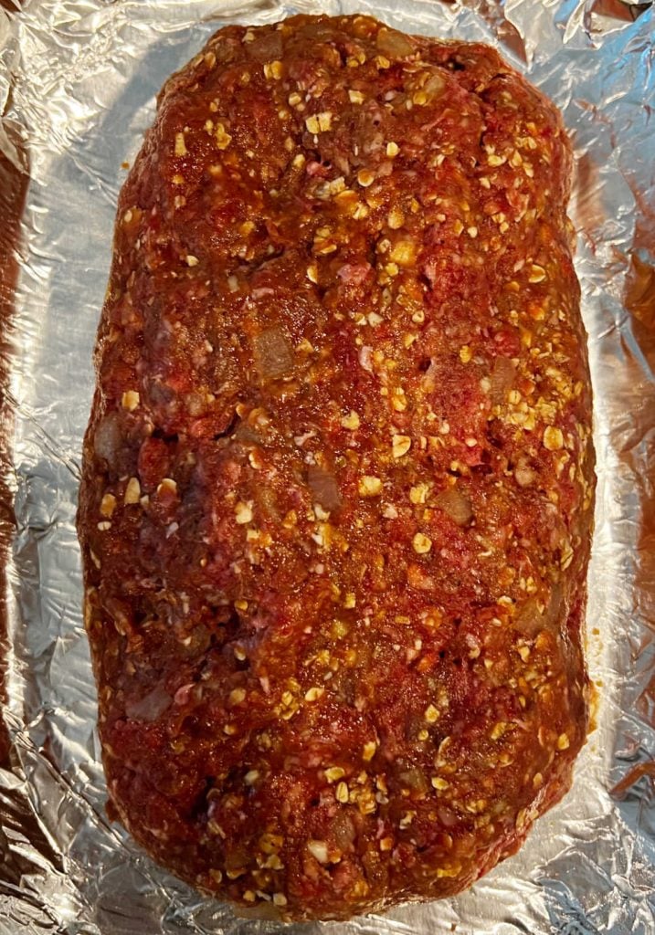 meat loaf with oats in baking dish.