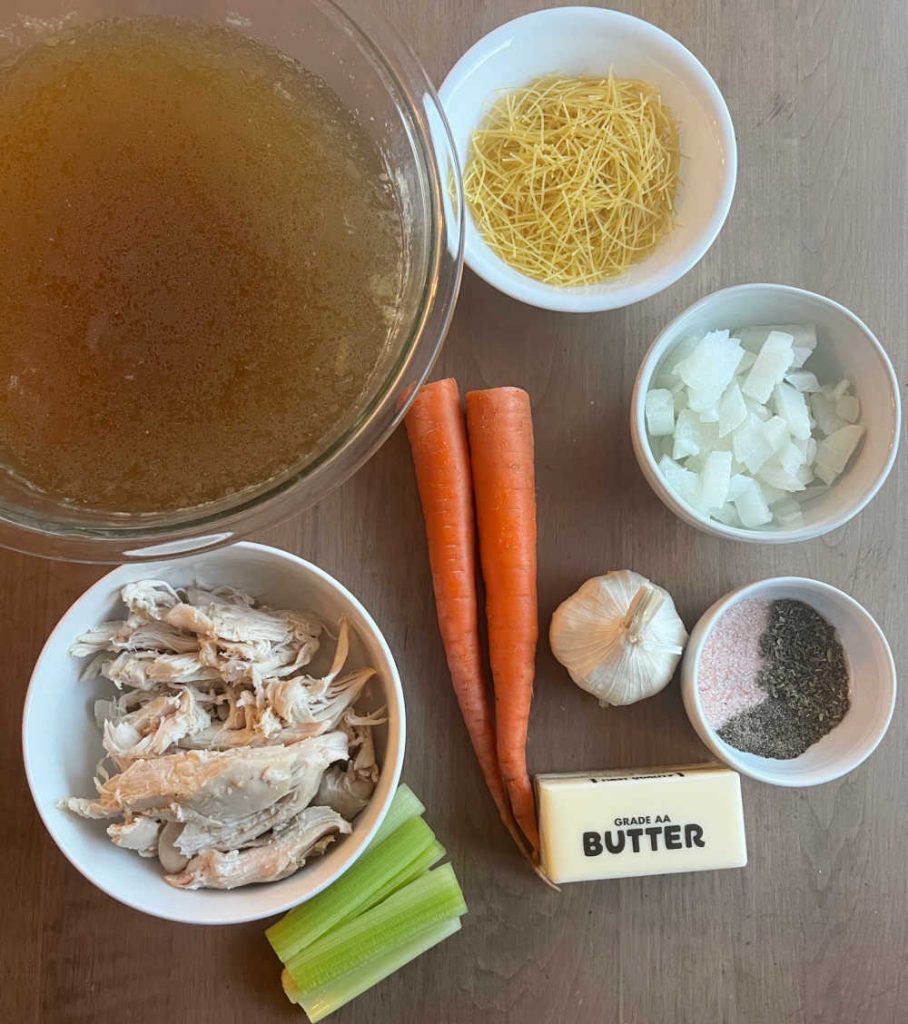homemade chicken stock, rotisserie chicken meat, noodles, onion, carrots, garlic, butter and seasonings.