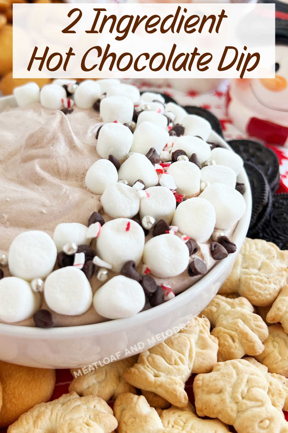 Hot Chocolate Dip is an easy no bake dessert dip made with hot cocoa mix and Cool Whip. This easy dessert recipe is perfect for holiday parties and family gatherings throughout the holiday season! via @meamel