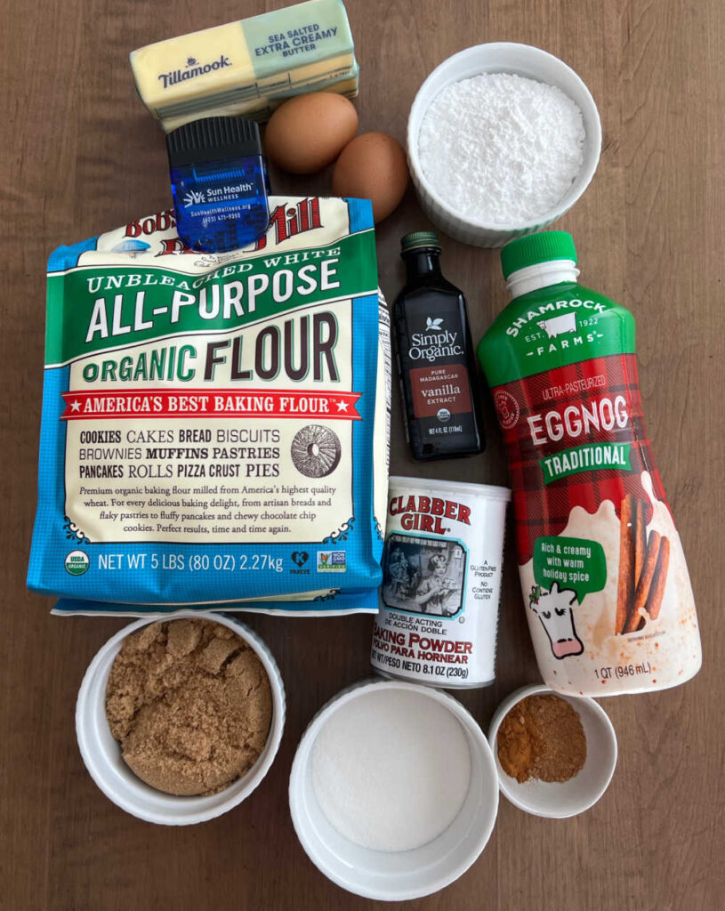 flour, eggs, butter, baking powder, vanilla, eggnog, brown sugar, sugar, spices and powdered sugar.