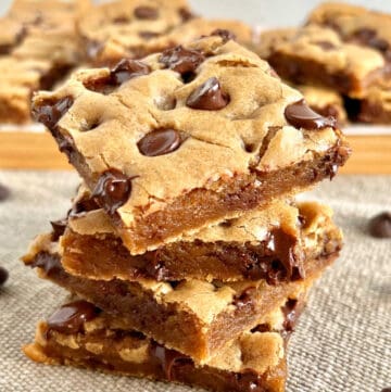 stack of chewy chocolate chip cookie bars.