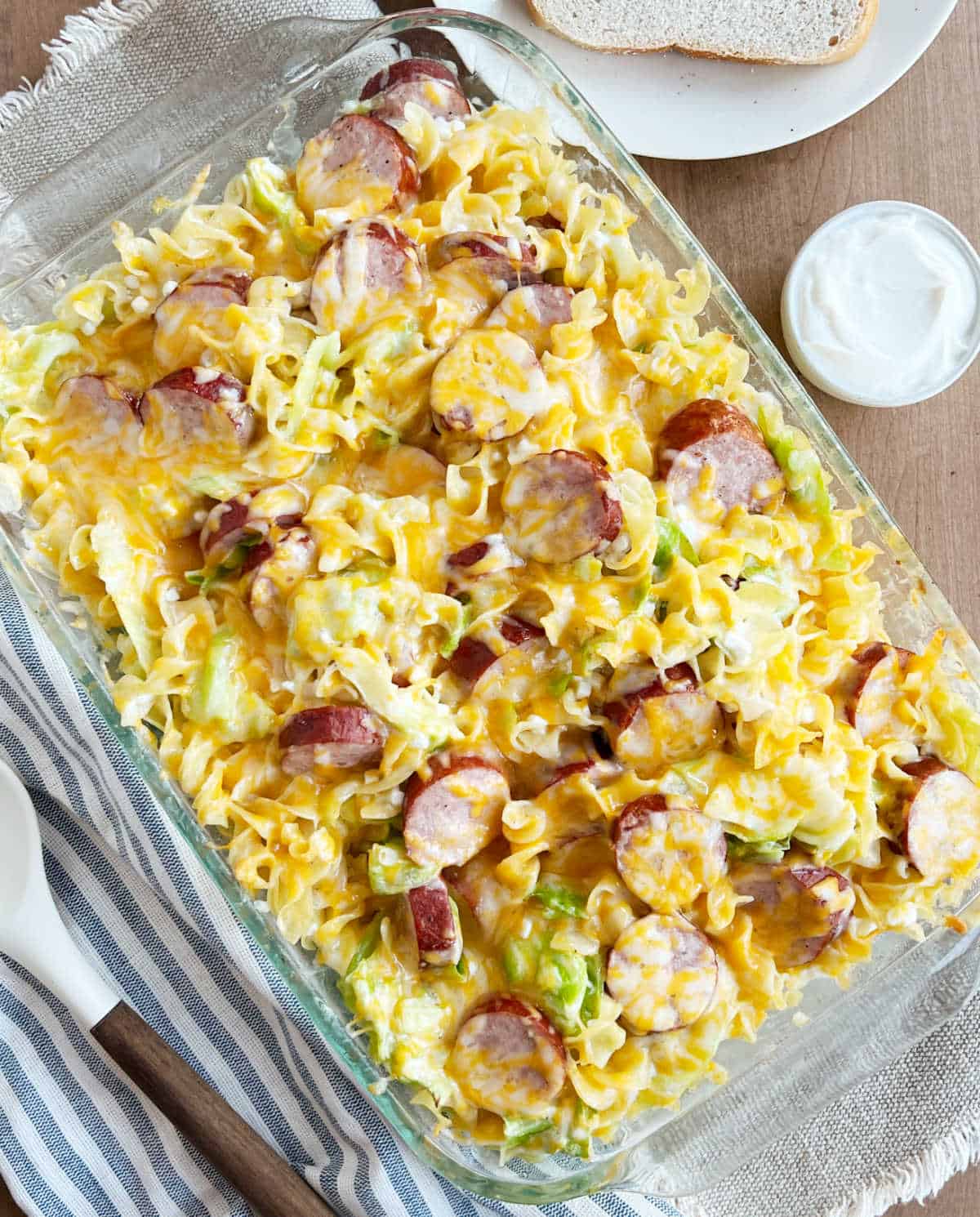 Polish casserole with cheese in baking dish.