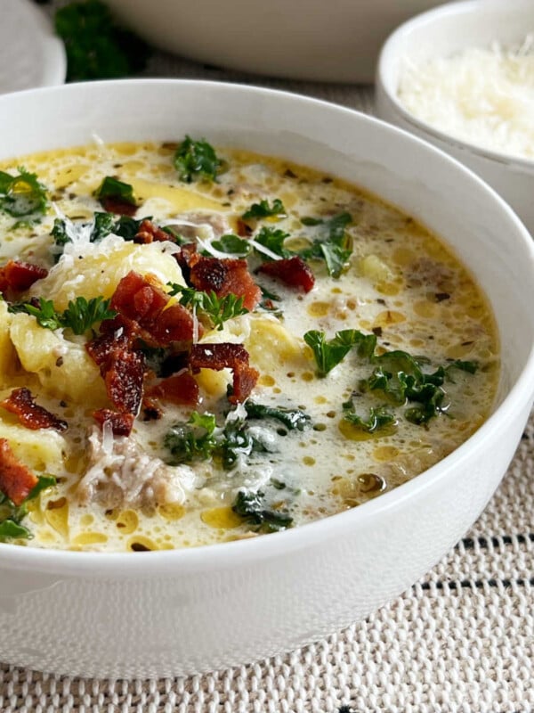 bowl of zuppa toscana soup with kale and bacon