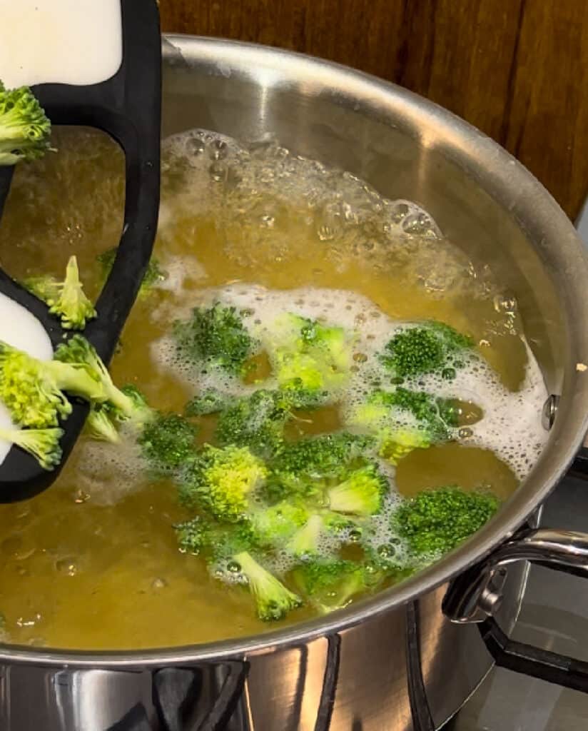 cook pasta and broccoli in boiling water.