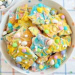 pastel colored Easter bark with mini eggs, marshmallow bits and pretzels.