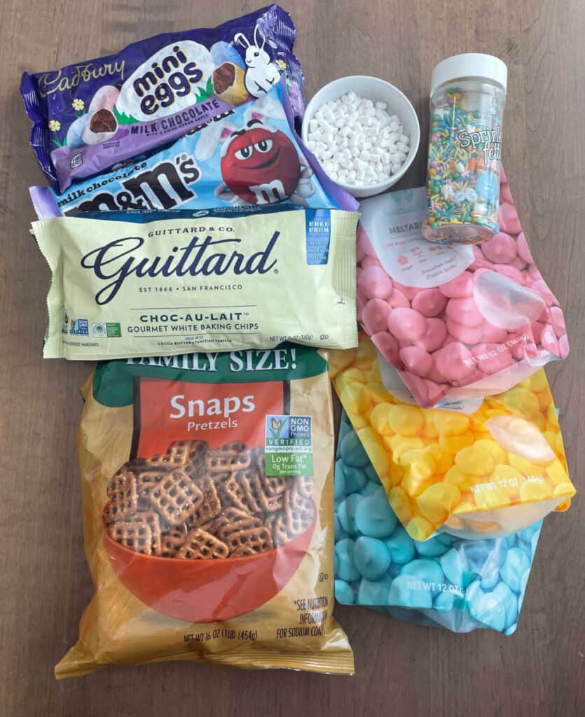 candy melts, white chocolate, candies, pretzel snaps, marshmallow bits and sprinkles.