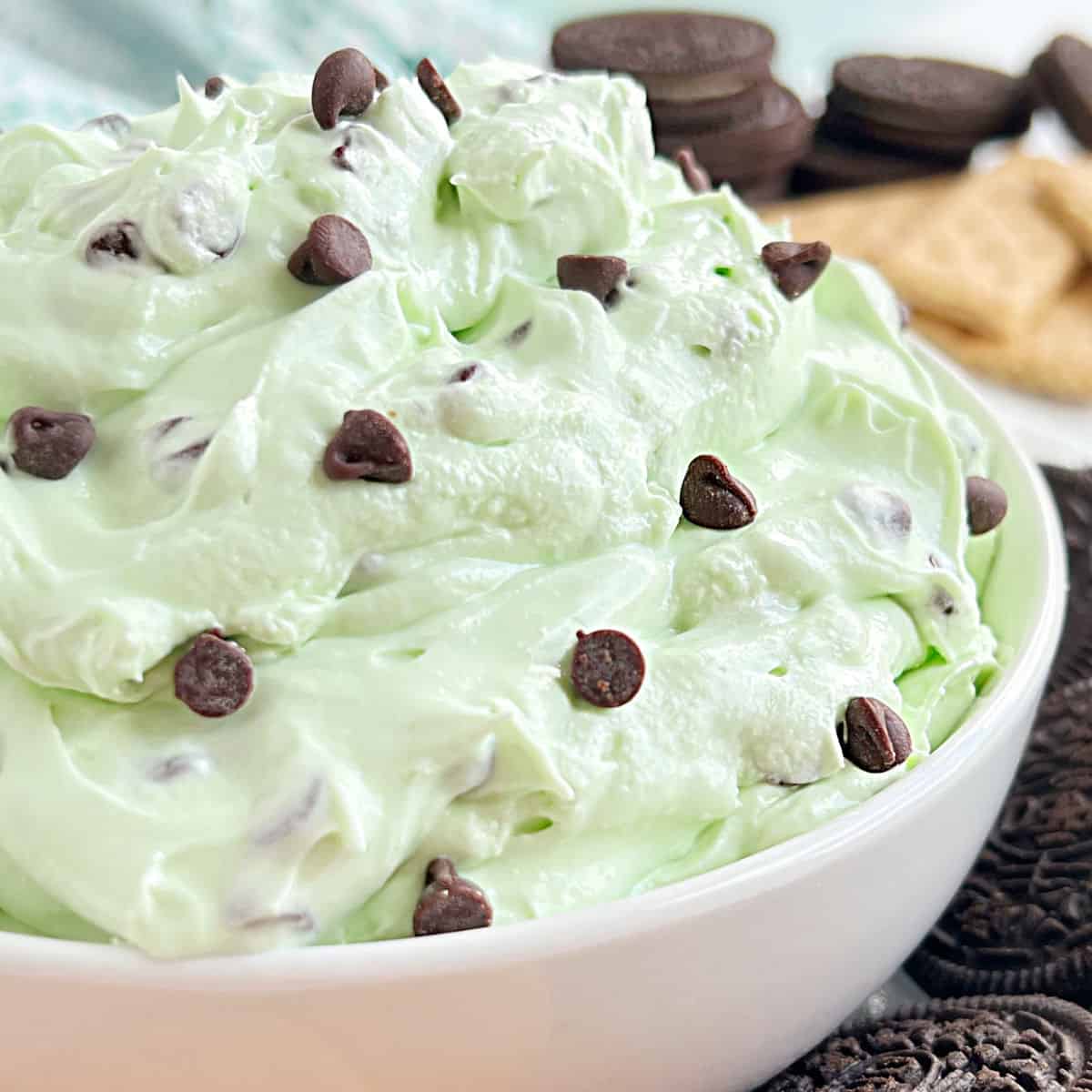 bowl of mint chocolate chip cheesecake dip.