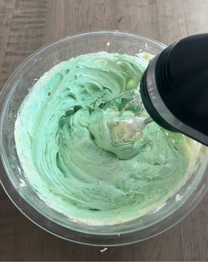 mix green cake mix cookie dough with electric mixer.