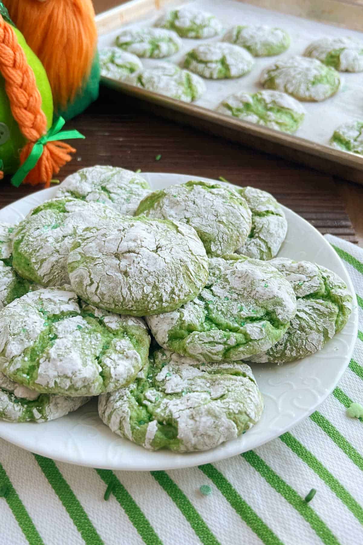 Green St. Patrick's Day crinkle cookies on the table.