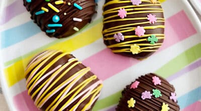 homemade chocolate peanut butter eggs decorated for Easter.