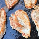 grilled chicken breasts on blackstone griddle.