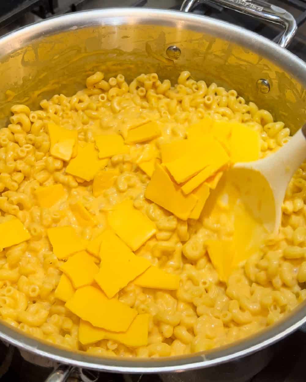 stir cheese into pasta.