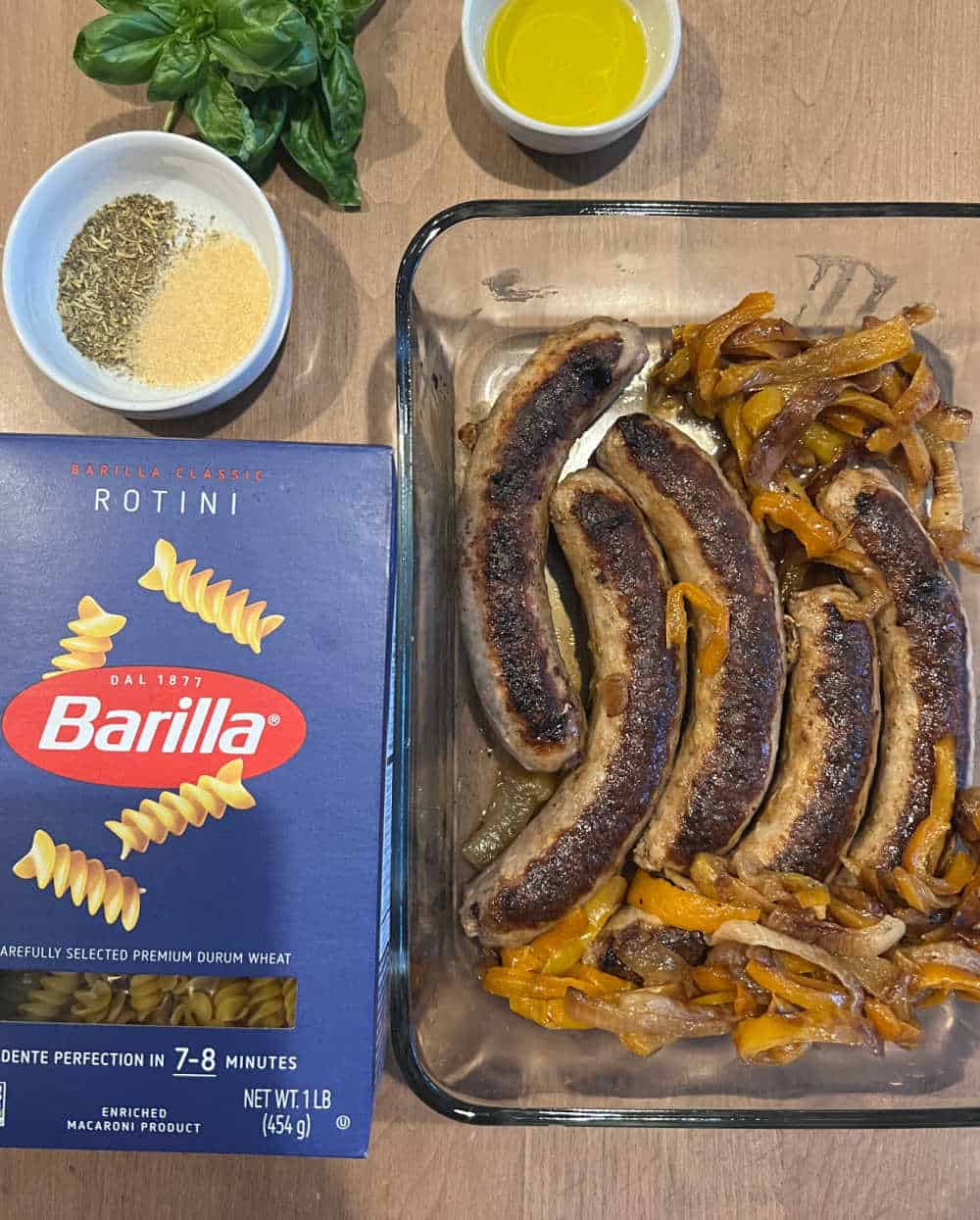 grilled italian sausages, peppers and onions, pasta, basil, olive oil, seasoning.