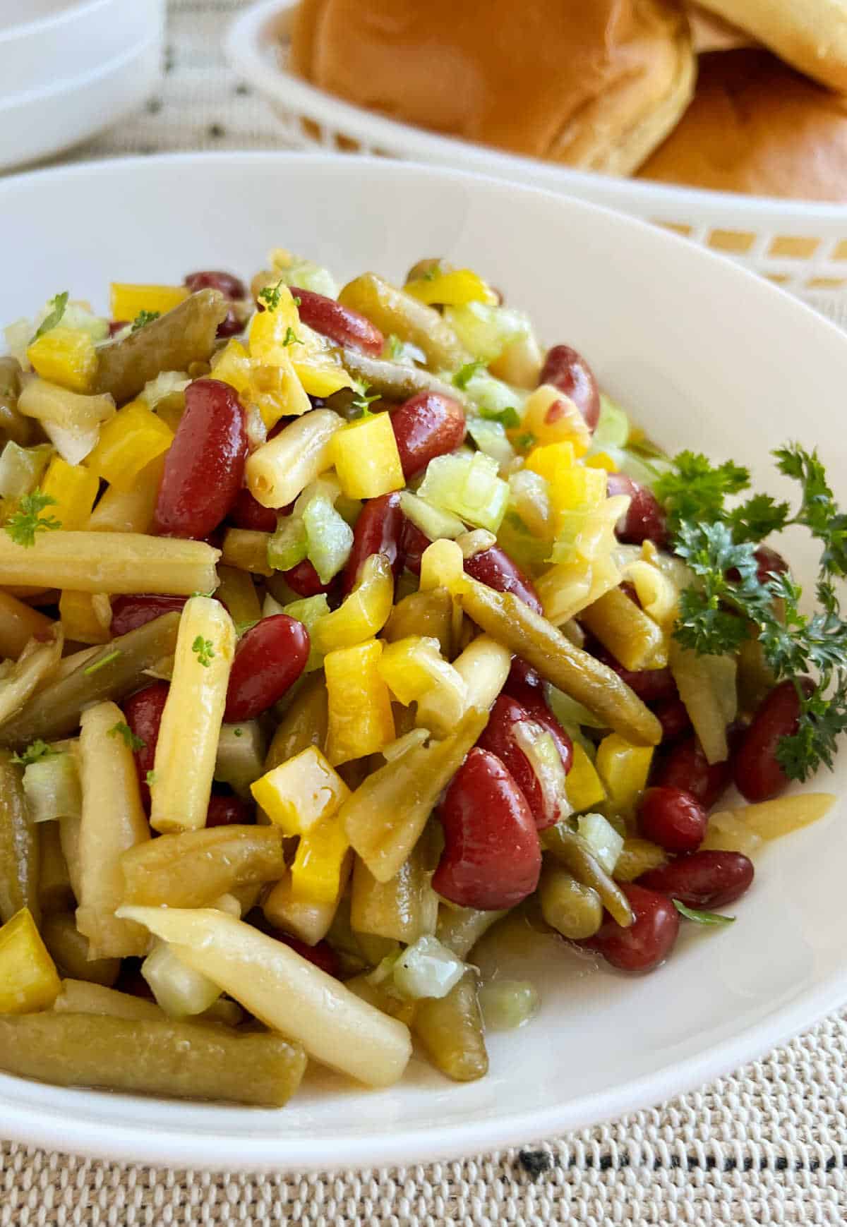 grandma's three bean salad in a serving bowl.