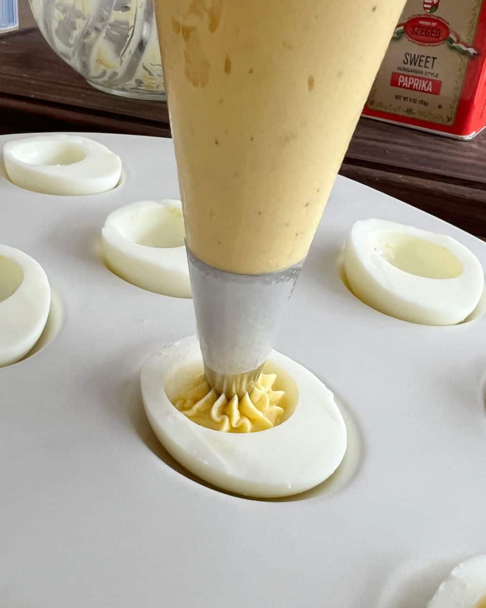 pipe stuffing into egg.