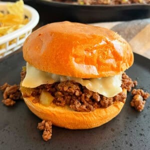 Philly cheesesteak sloppy joes with melted cheese.
