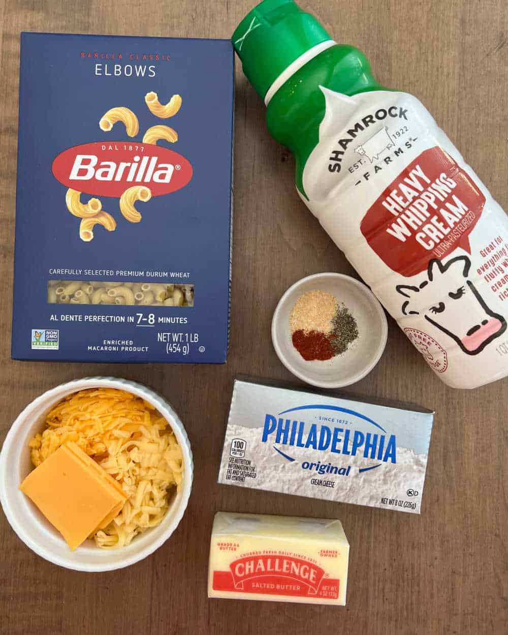 elbow macaroni, heavy cream, seasonings, cream cheese, butter, cheese.