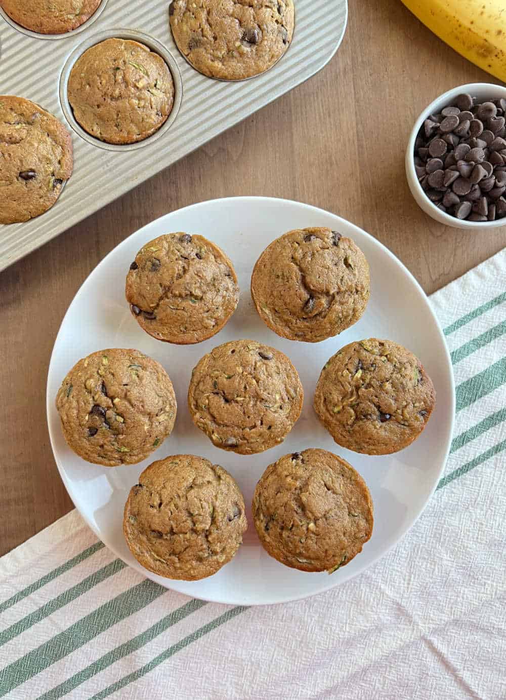 plate of banana zucchini muffins.