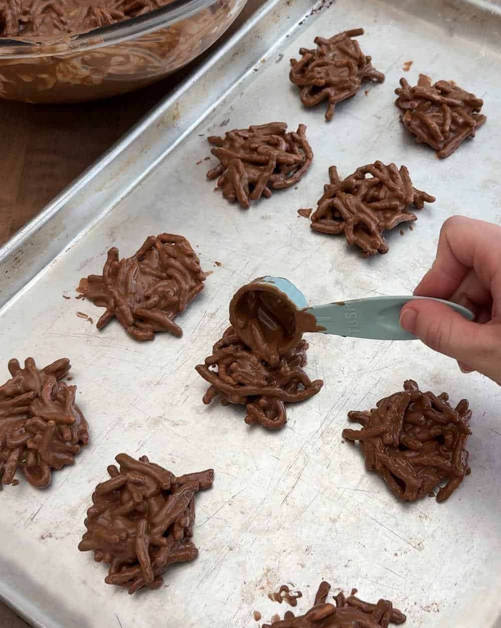 drop nests on baking sheet.