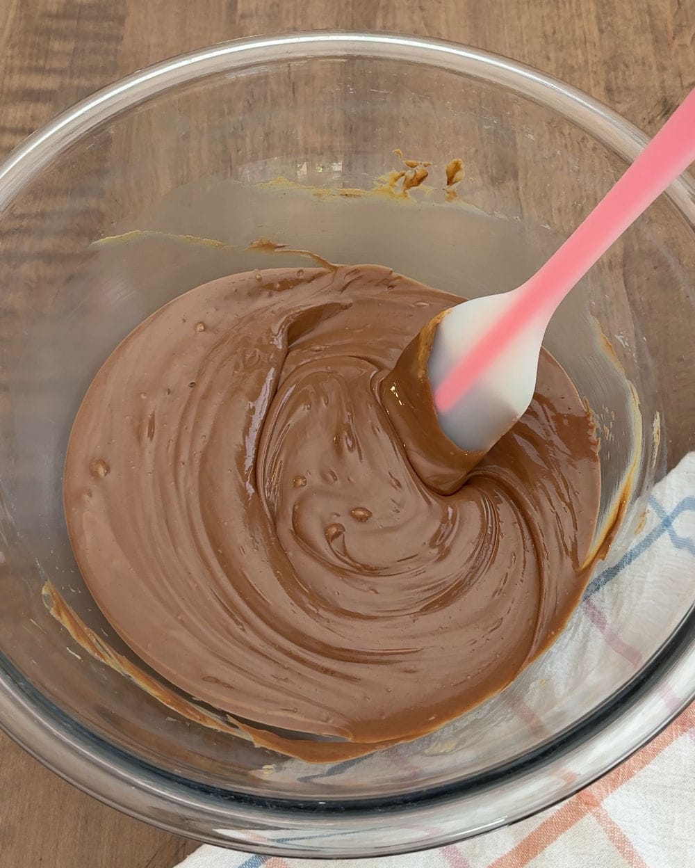 stir melted chocolate and PB in bowl.