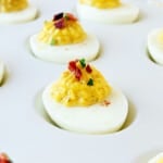 bacon ranch deviled eggs with parsley and paprika.