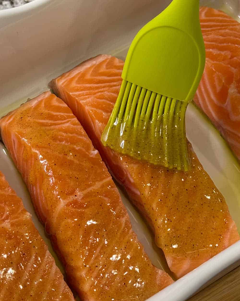 brush sauce on salmon.