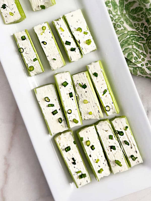 stuffed celery with cream cheese topped with chives.