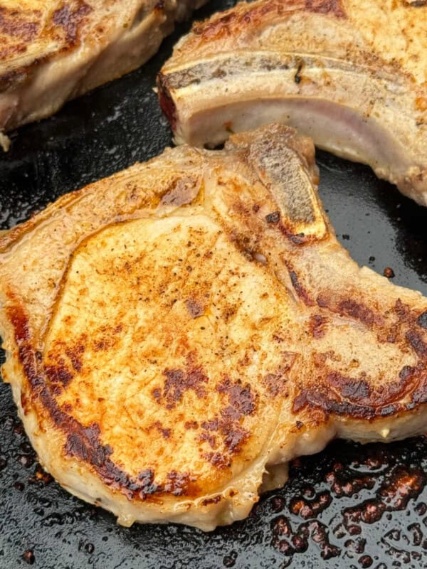 bone-in pork chops on blackstone griddle.