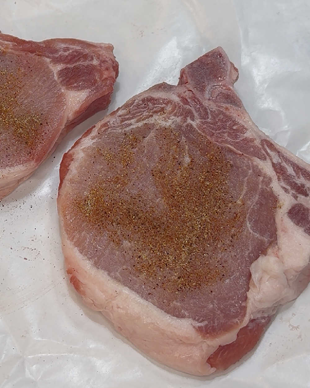 season chops with rub.