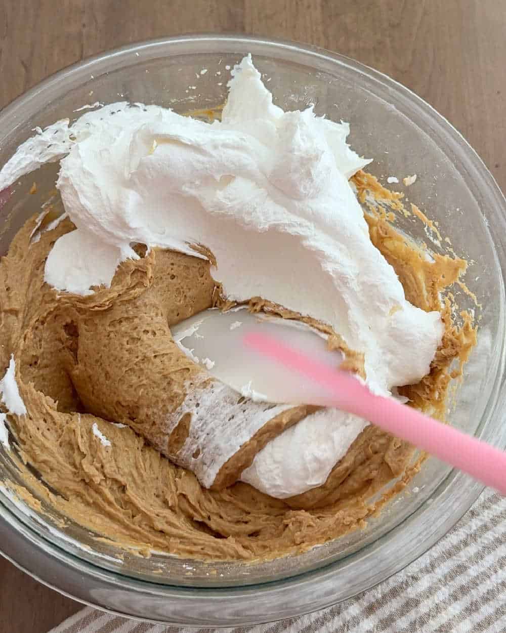 fold whipped topping in filling.