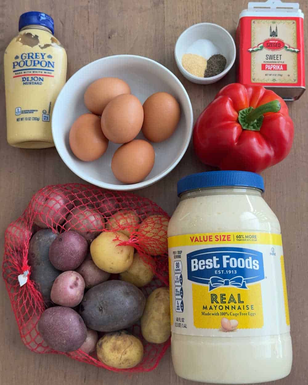 baby potatoes, eggs, mustard, spices, red pepper and mayo.