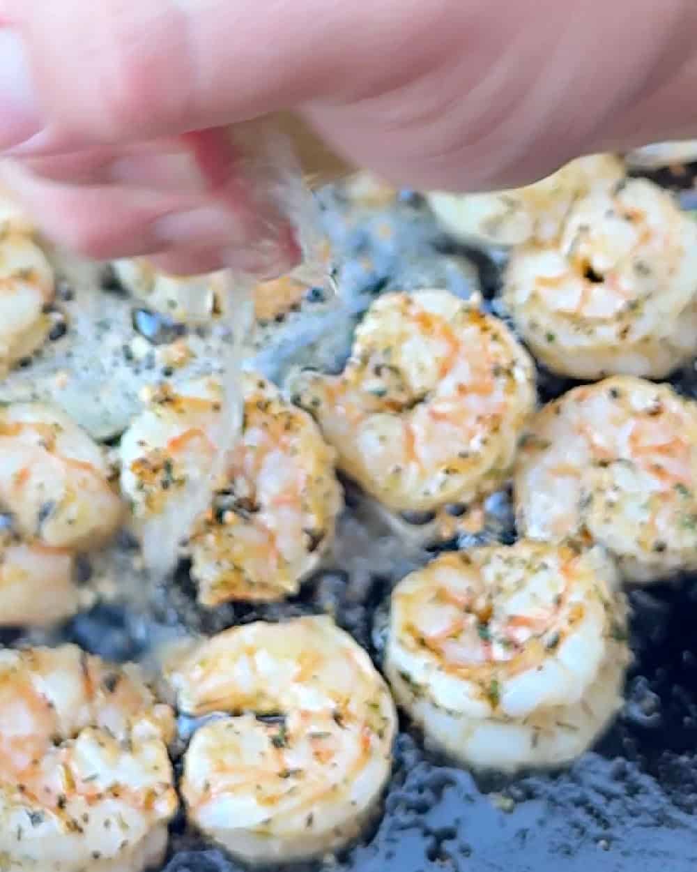 squeeze lemon juice on shrimp.