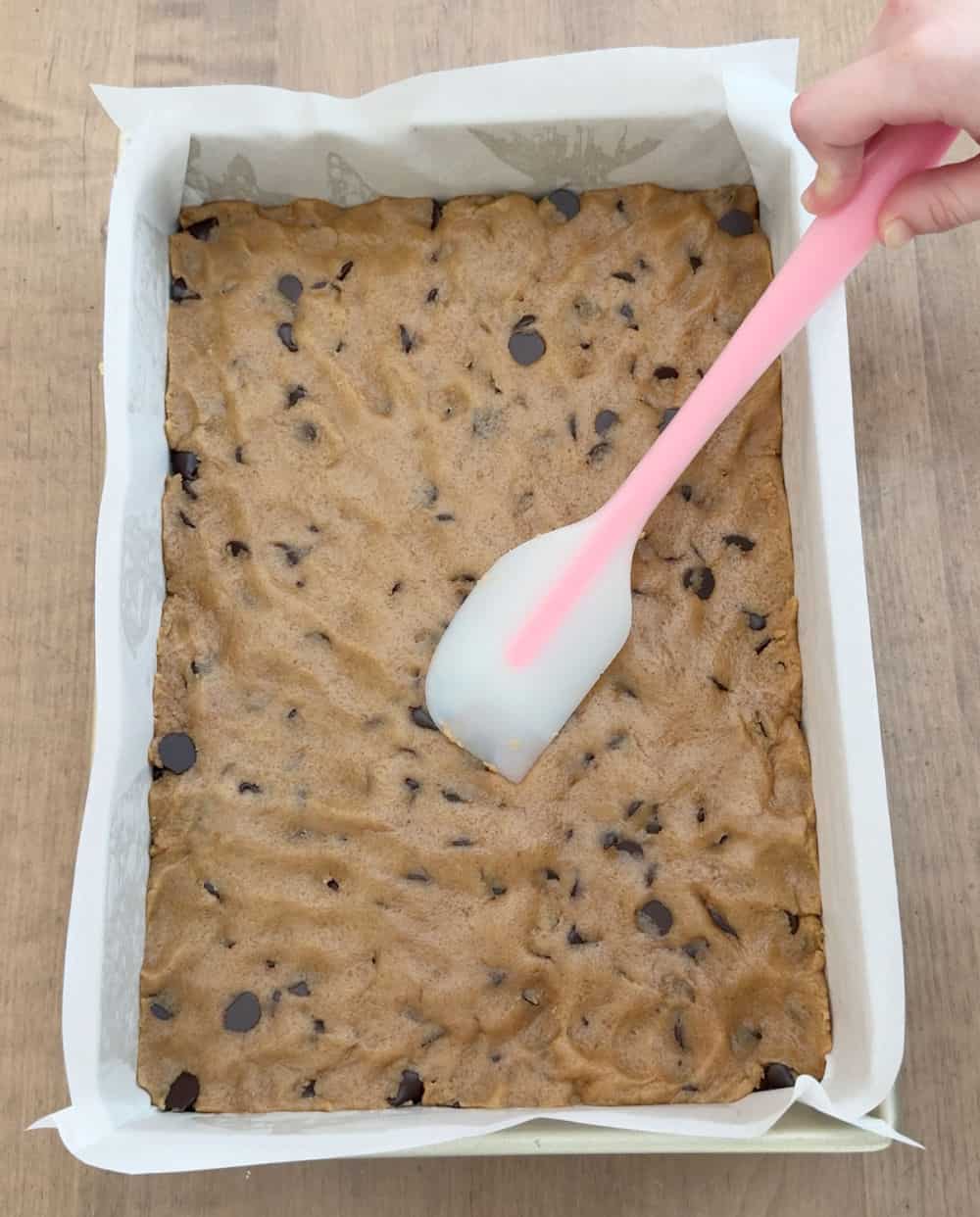 press dough into baking pan.